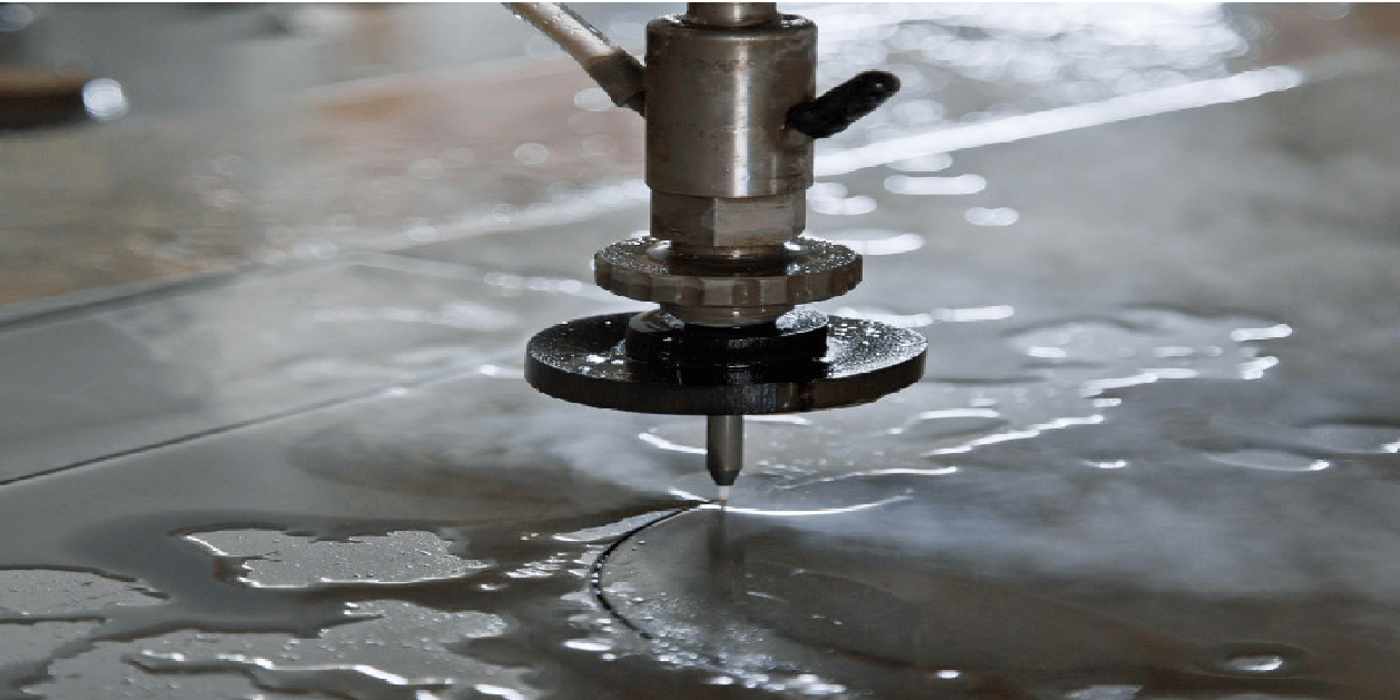 Waterjet cutting machine slicing through material.